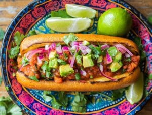 Traditional Oaxacan plantain sandwich served with salsa and avocado