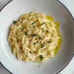 Freshly cooked orzo pasta with herbs and olive oil