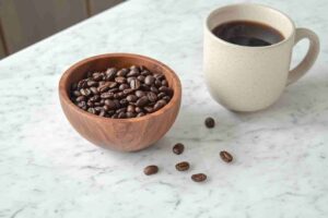 Freshly Roasted Whole Bean Coffee on a Marble Surface